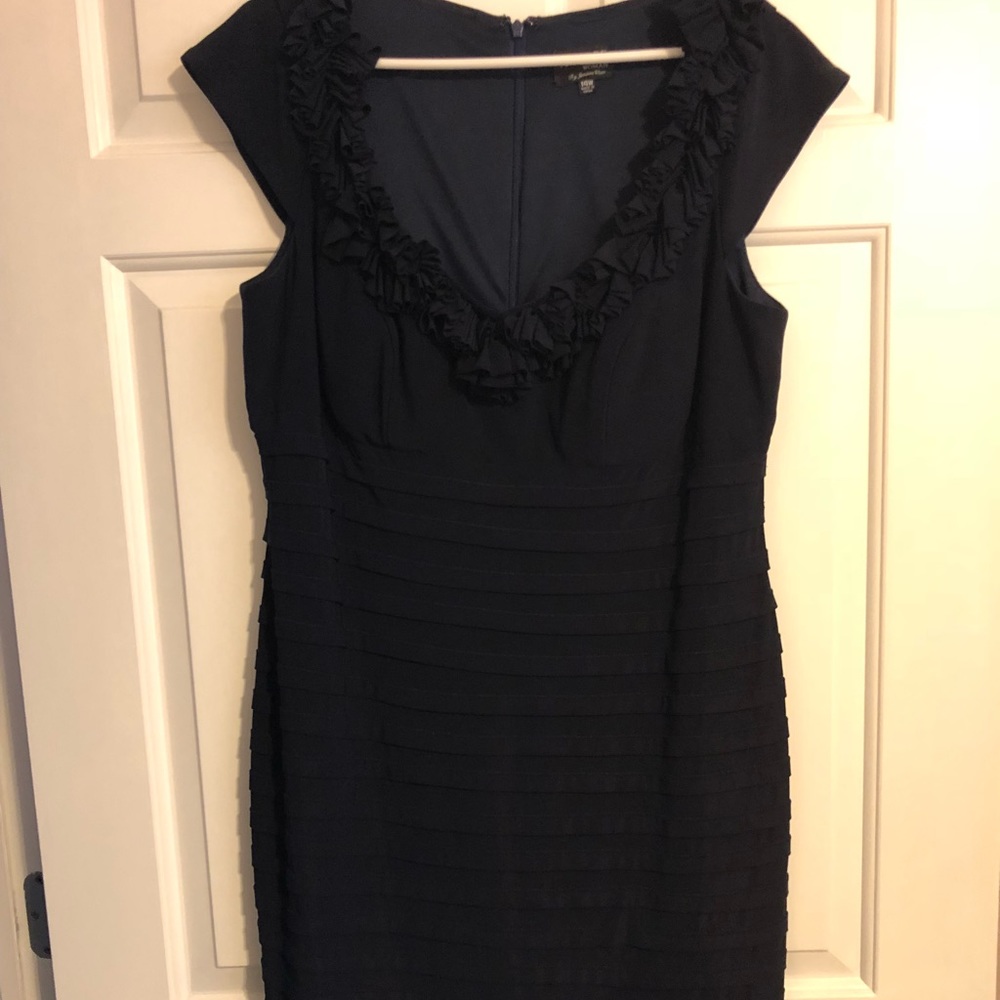 Navy cap-sleeve dress with ruffle neckline